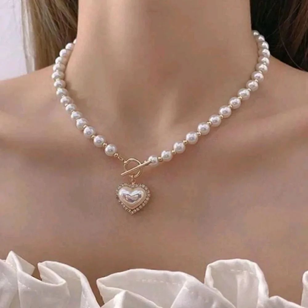 Faux Pearl Necklace with a Gold Heart Pendant